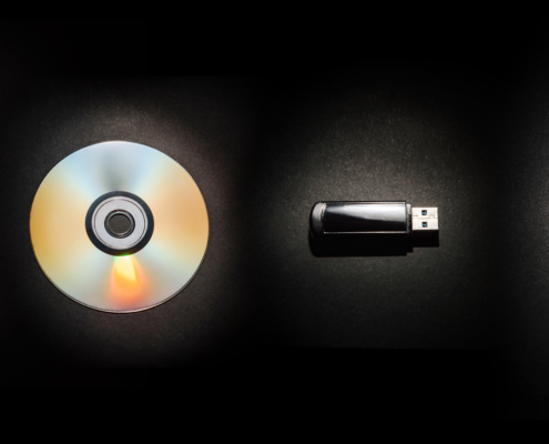 Photo of floppy disk to a CD to a thumb drive to video cloud storage4